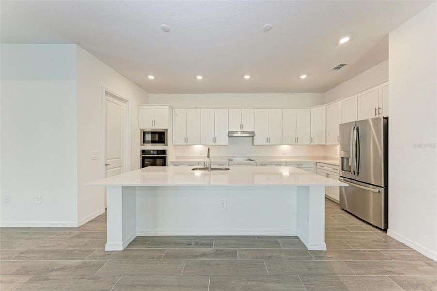 Furnished interior view inside a new home in Wellen Park Golf & Country Club: Executive Homes, Venice (Image 9).