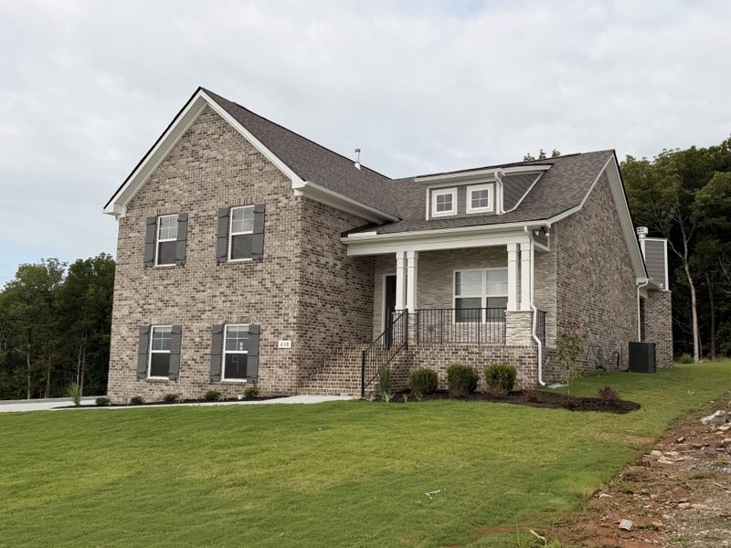 Front exterior of a new home in Patterson, Smyrna, TN, highlighting curb appeal (Image 2). Front exterior of a new home in Patterson, Smyrna, TN, highlighting curb appeal (Image 2).