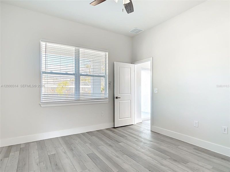 Spacious, unfurnished interior of a new home in , Port Charlotte (Image 30).
