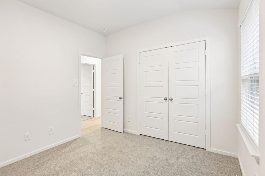 Spacious, unfurnished interior of a new home in Riviera Pines - Traditional Series, Conroe (Image 17).