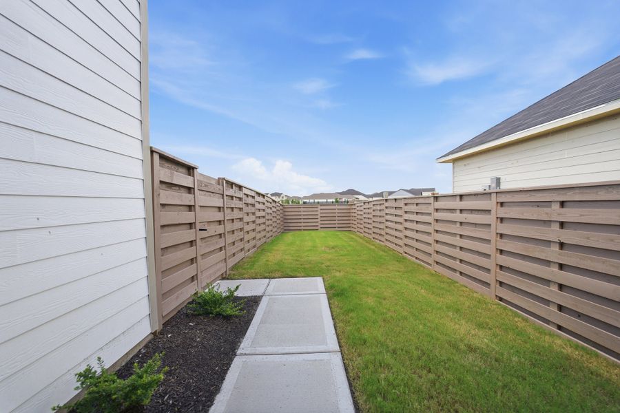 Exterior details and patio area of a home in Austin Point, Richmond (Image 27).