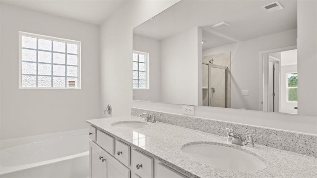 Furnished interior view inside a new home in Fairway 17 at Mirror Lake, Villa Rica (Image 11).