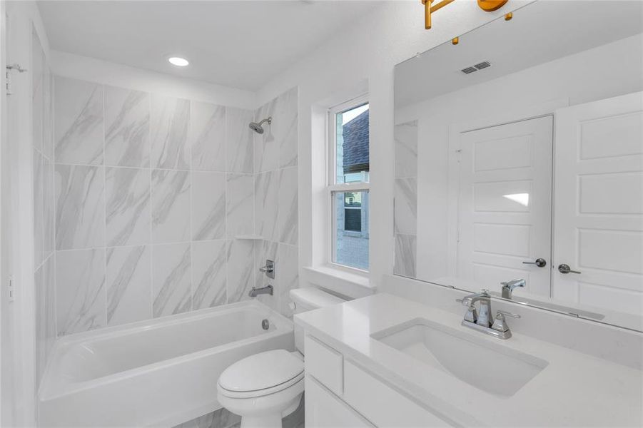 Full bath with  shower combination and vanity