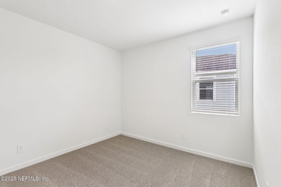 Spacious, unfurnished interior of a new home in Lakes at Bella Lago - Signature Series, Green Cove Springs (Image 23).