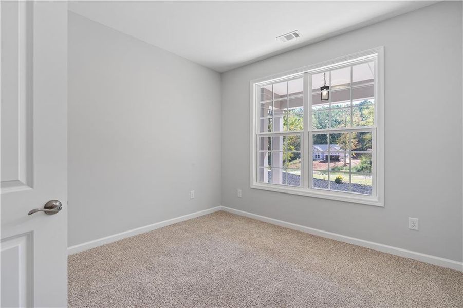 Spacious, unfurnished interior of a new home in , Gray (Image 43).