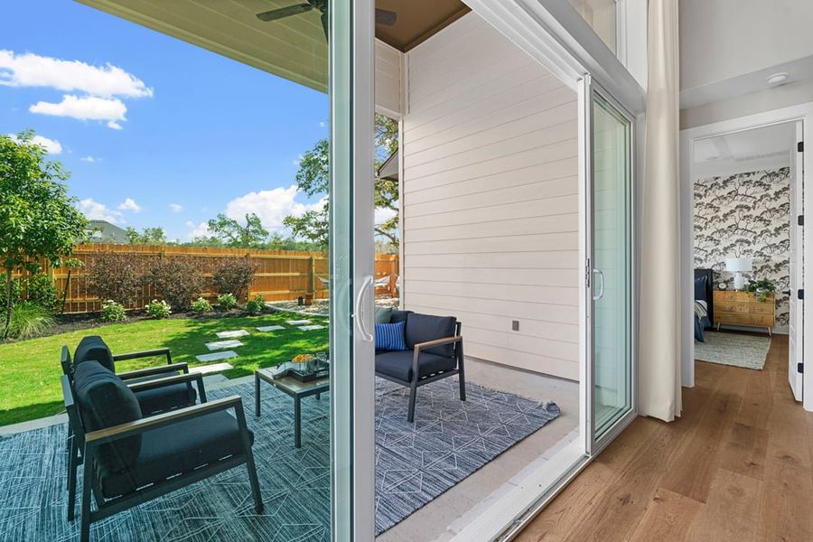 Exterior details and patio area of a home in Arbor Collection at Heritage, Dripping Springs (Image 2).