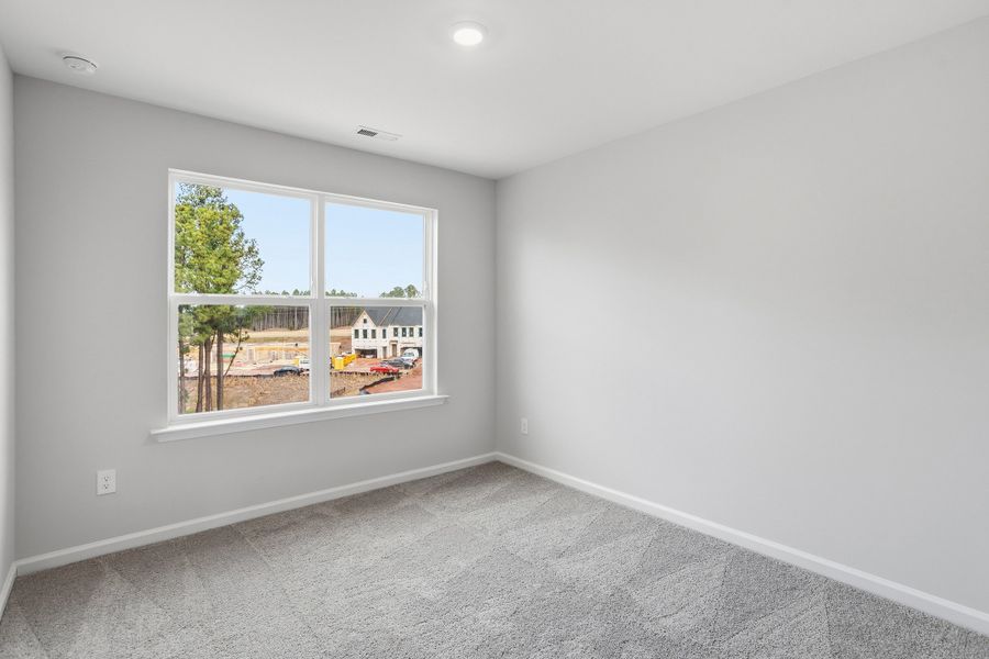 Spacious, unfurnished interior of a new home in Sweetbrier, Durham (Image 29).