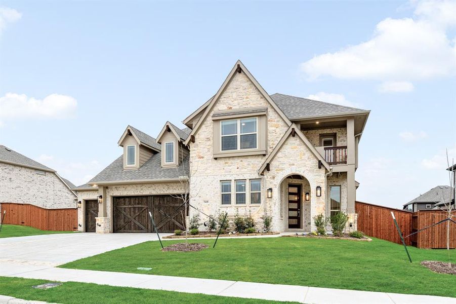 Front exterior of a new home in Hayes Crossing, Midlothian, TX, highlighting curb appeal (Image 2). Front exterior of a new home in Hayes Crossing, Midlothian, TX, highlighting curb appeal (Image 2).