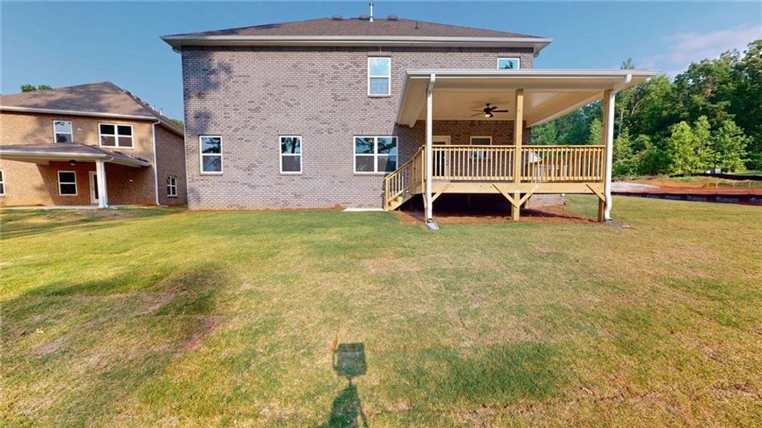 Exterior details and patio area of a home in Mirror Lake at South Harbour, Villa Rica (Image 3).