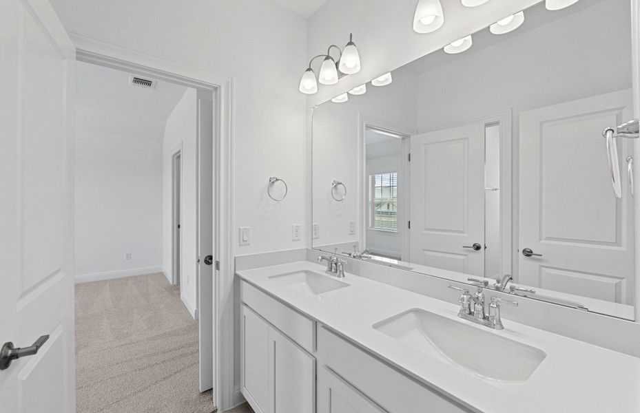Furnished interior view inside a new home in Bluffview Reserve, Leander (Image 10).