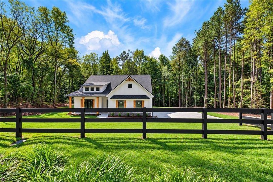 Front exterior of a new home in , Silver Creek, GA, highlighting curb appeal (Image 25). Front exterior of a new home in , Silver Creek, GA, highlighting curb appeal (Image 25).