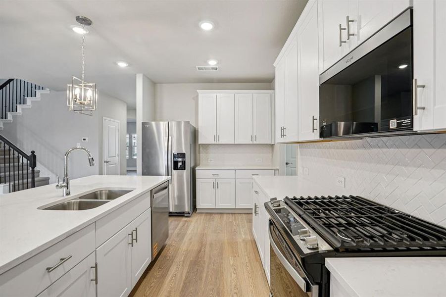 Photo is not of the actual home, but is an inspirational photo of builder’s model home and may depict options, furnishings, and/or decorator features that are not included.