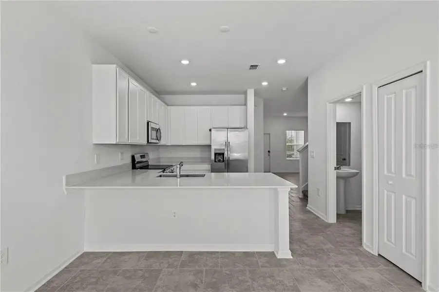 Furnished interior view inside a new home in , Davenport (Image 5).