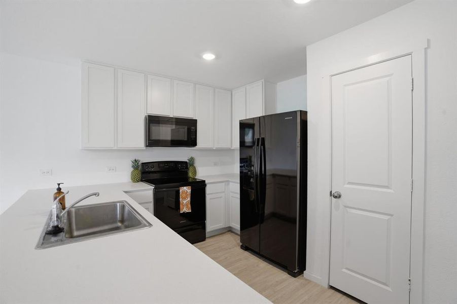 Furnished interior view inside a new home in Tillage Farms, Princeton (Image 7).