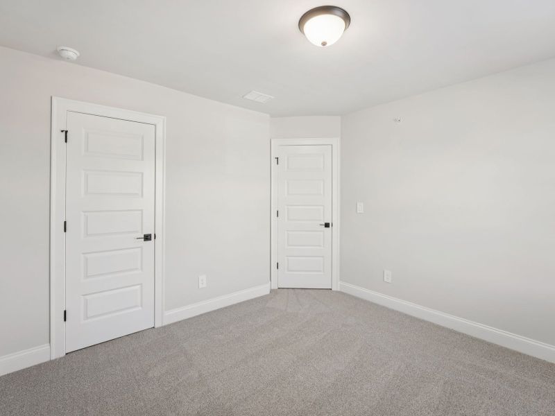 Spacious, unfurnished interior of a new home in Hemingway - Highland Series, Cumming (Image 20).
