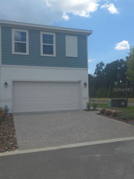 Exterior details and patio area of a home in Delaney Reserve, Deland (Image 28).