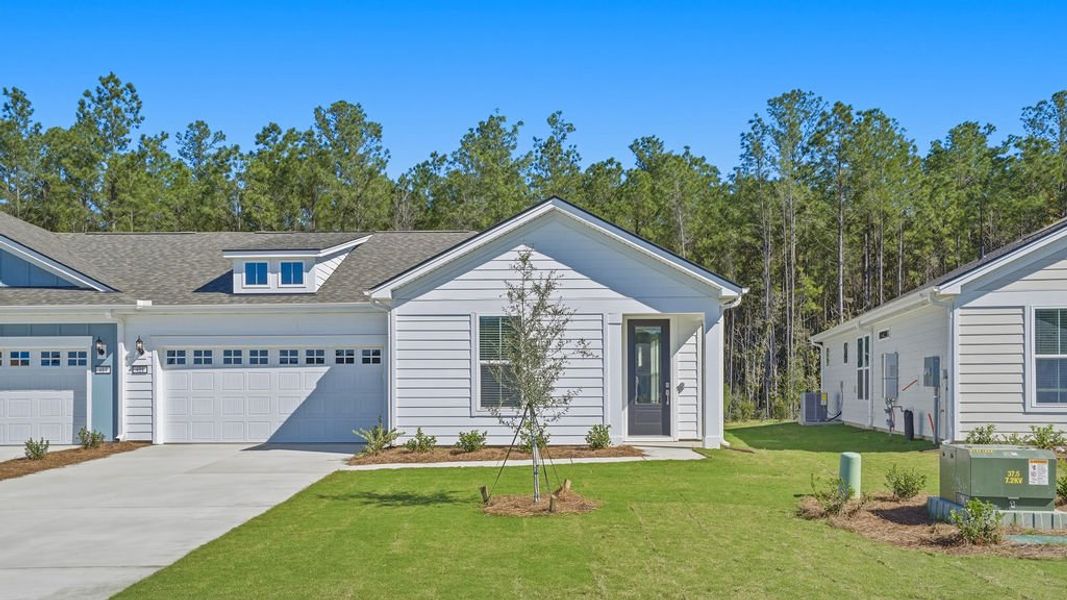 Front exterior of a new home in Sun City Hilton Head, Bluffton, SC, highlighting curb appeal (Image 22).