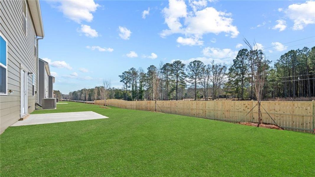 Exterior details and patio area of a home in Poplar Preserve, Newnan (Image 2).