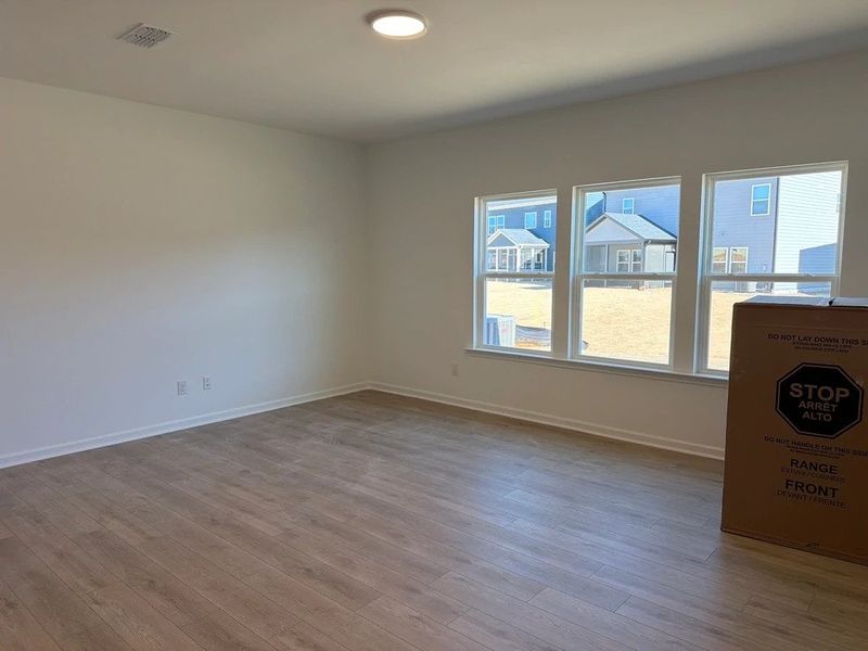 Family Room featuring the AW Collection® Sapphire - Bold tones and playful patterns shine here.