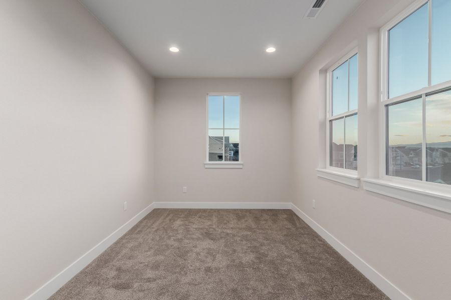 Representative unfurnished interior of a home built from the Luxe by Scott Felder Homes in Westerly, Erie (Image 35).