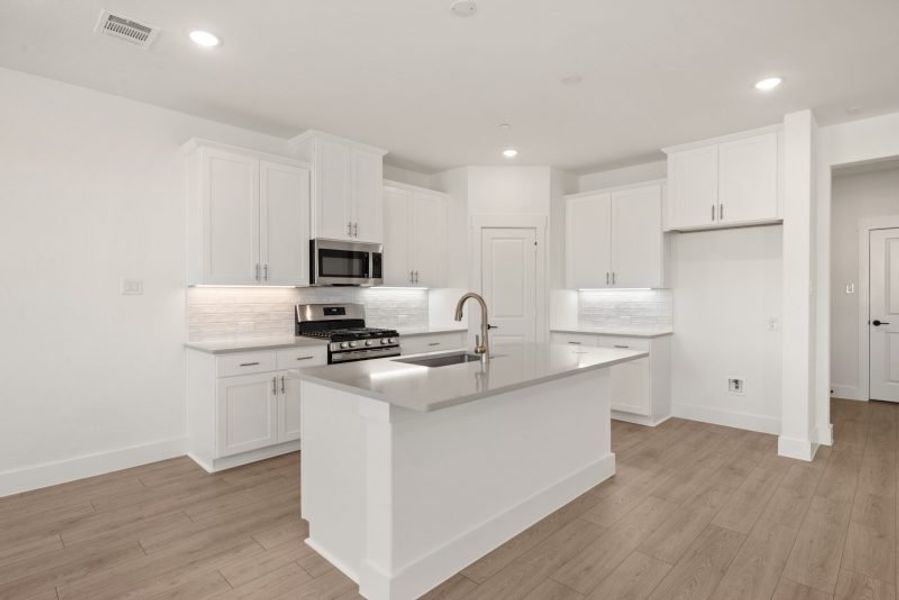 Furnished interior view inside a new home in Mosaic, Prosper (Image 6).