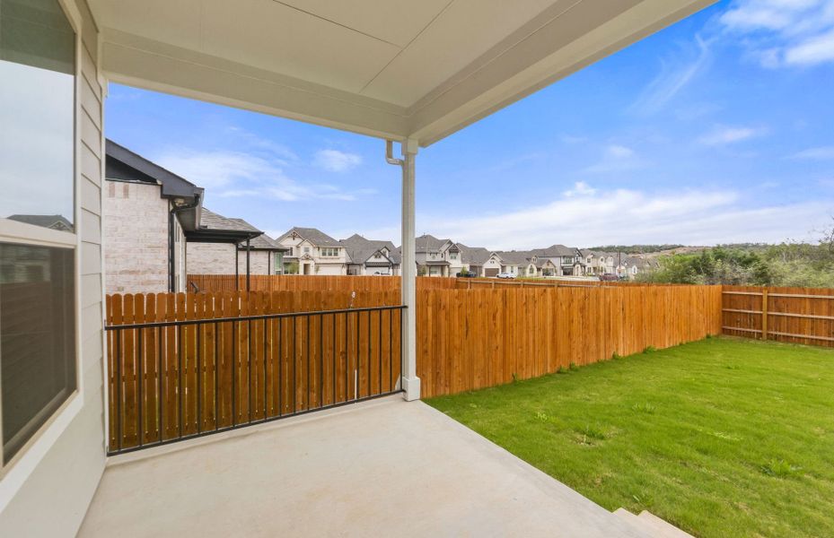 Exterior details and patio area of a home in Saddleback at Santa Rita Ranch, Liberty Hill (Image 26).