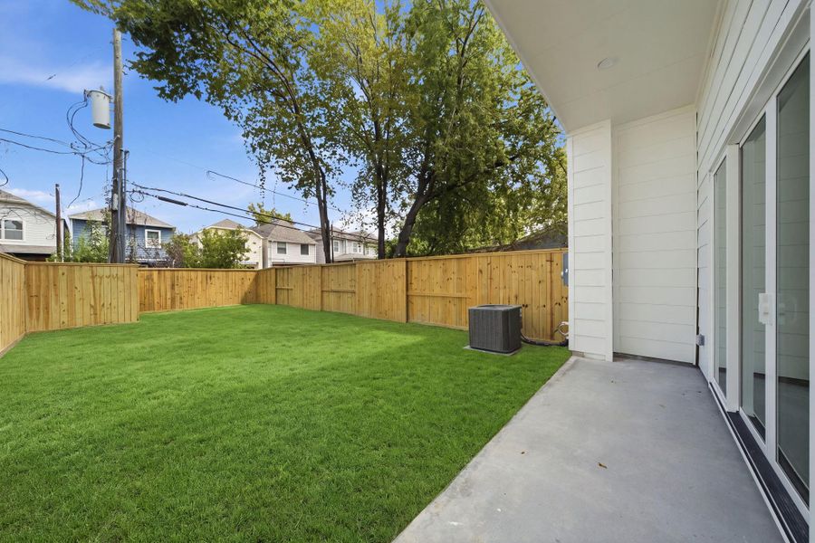 Exterior details and patio area of a home in , Houston (Image 3).