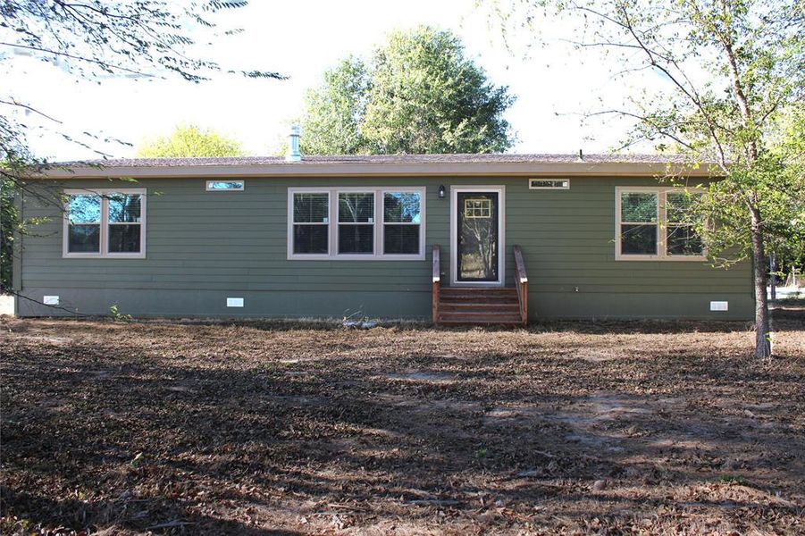 Ranch-style house with crawl space and entry steps Ranch-style house with crawl space and entry steps