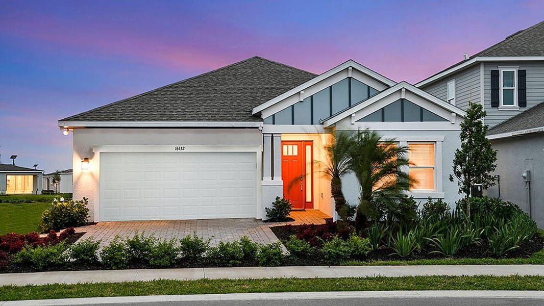 Representative exterior photo of a completed home built from the Grenada by Taylor Morrison in The Cove at West Port, Port Charlotte, FL (Image 19).
