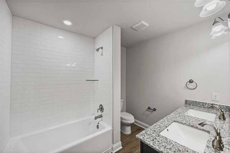 Furnished interior view inside a new home in Stonebrooke, Conroe (Image 6).