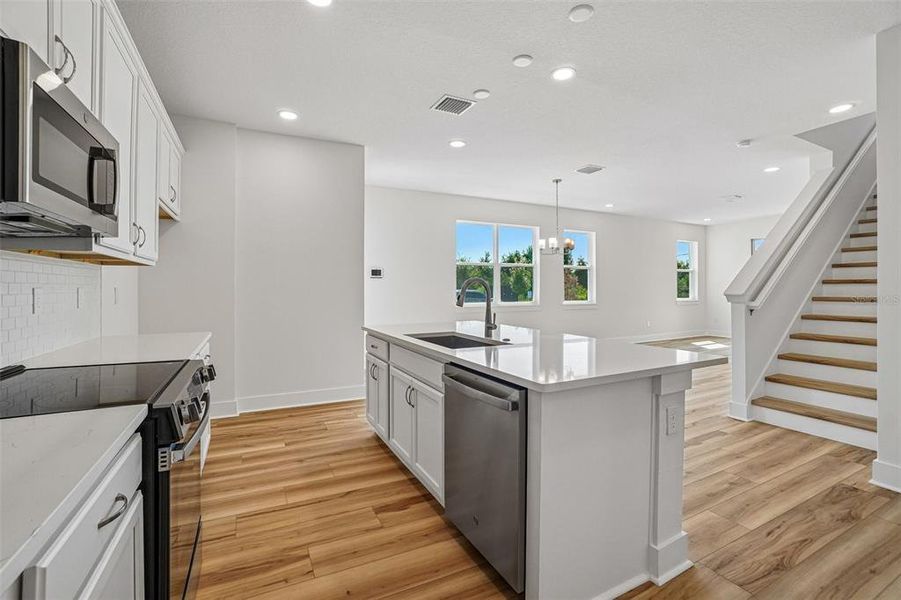 Furnished interior view inside a new home in Lagoon Residences at Epperson, Wesley Chapel (Image 9).