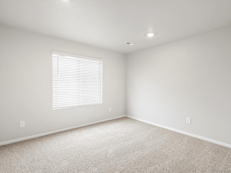 Spacious, unfurnished interior of a new home in Poudre Heights: The Lakes Collection, Windsor (Image 23).