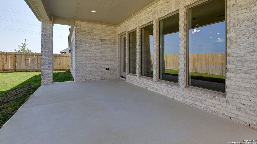 Exterior details and patio area of a home in Arcadia Ridge 50', San Antonio (Image 4). Exterior details and patio area of a home in Arcadia Ridge 50', San Antonio (Image 4).