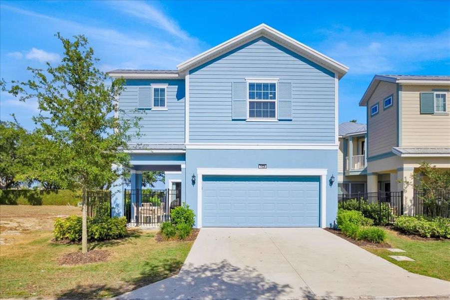 Front exterior of a new home in , Reunion, FL, highlighting curb appeal (Image 21).