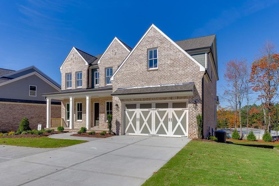 Front exterior of a new home in , Buford, GA, highlighting curb appeal (Image 2).