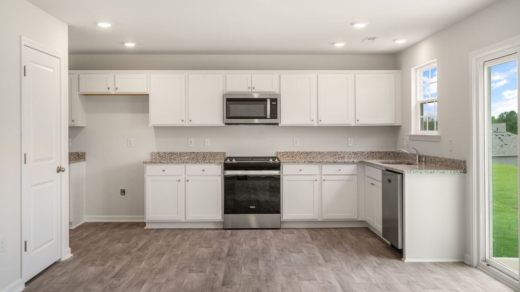 Furnished interior view inside a new home in Faircrest, Greensboro (Image 3). Furnished interior view inside a new home in Faircrest, Greensboro (Image 3).