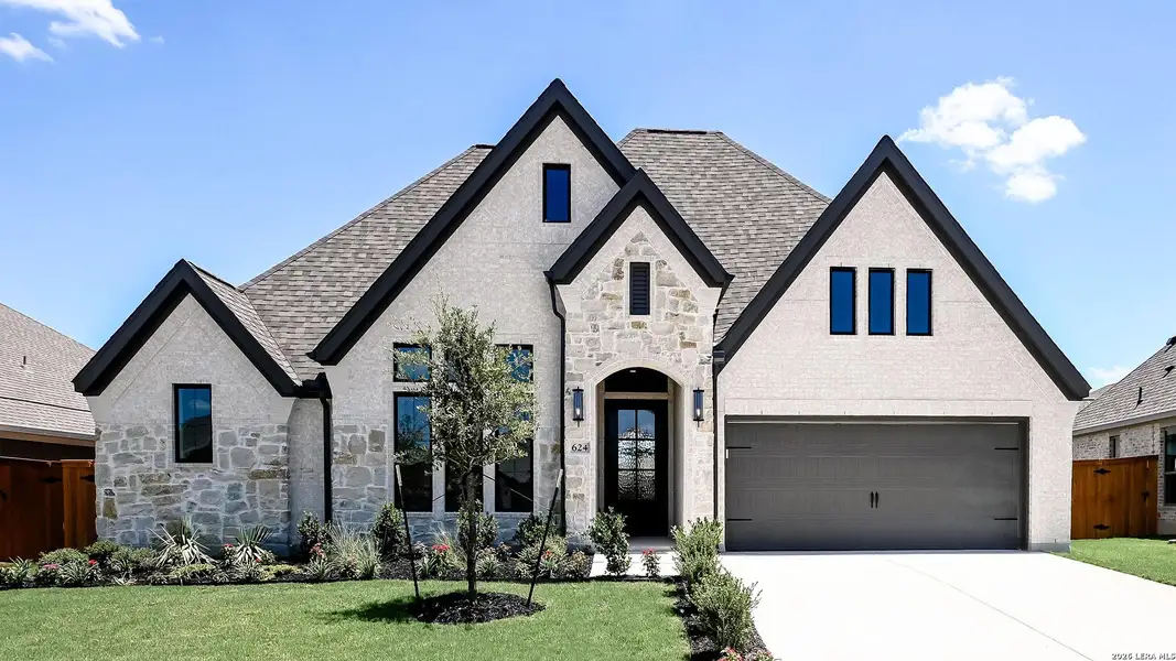 Front exterior of a new home in Veramendi, New Braunfels, TX, highlighting curb appeal (Image 18).