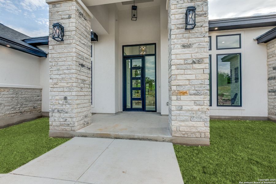 Front exterior of a new home in , Mico, TX, highlighting curb appeal (Image 22).