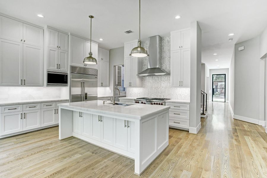 Designer selected countertops and backsplash. Wonderful large island with room for bar stools. Designer selected countertops and backsplash. Wonderful large island with room for bar stools.