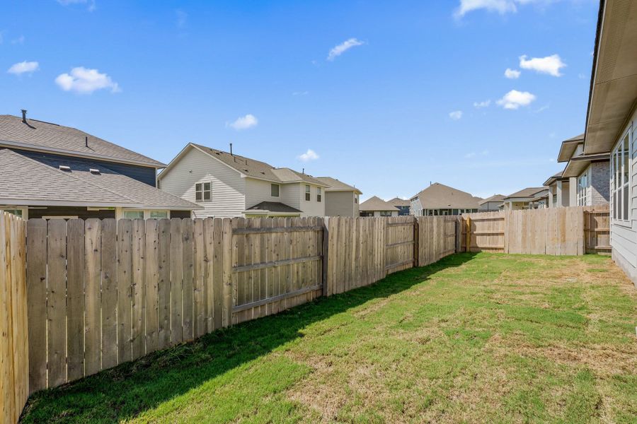 Exterior details and patio area of a home in Lariat, Liberty Hill (Image 27). Exterior details and patio area of a home in Lariat, Liberty Hill (Image 27).