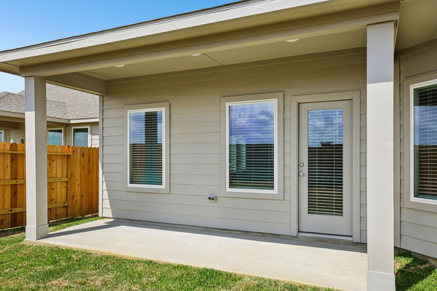 Exterior details and patio area of a home in Sanford Farms - Premier Series, Waller (Image 23).