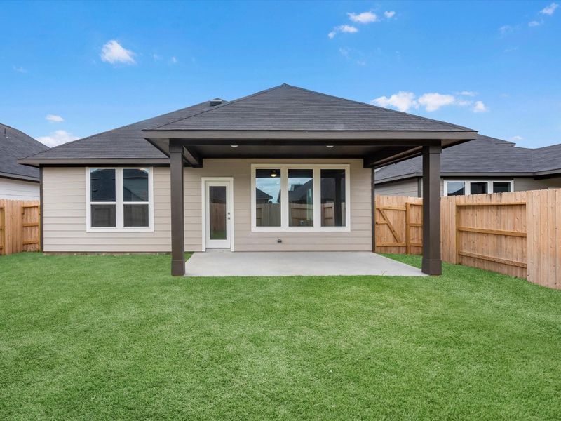 Exterior details and patio area of a home in Mason Woods, Cypress (Image 4).