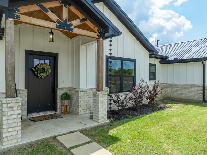 Front exterior of a new home in , Rockdale, TX, highlighting curb appeal (Image 18).