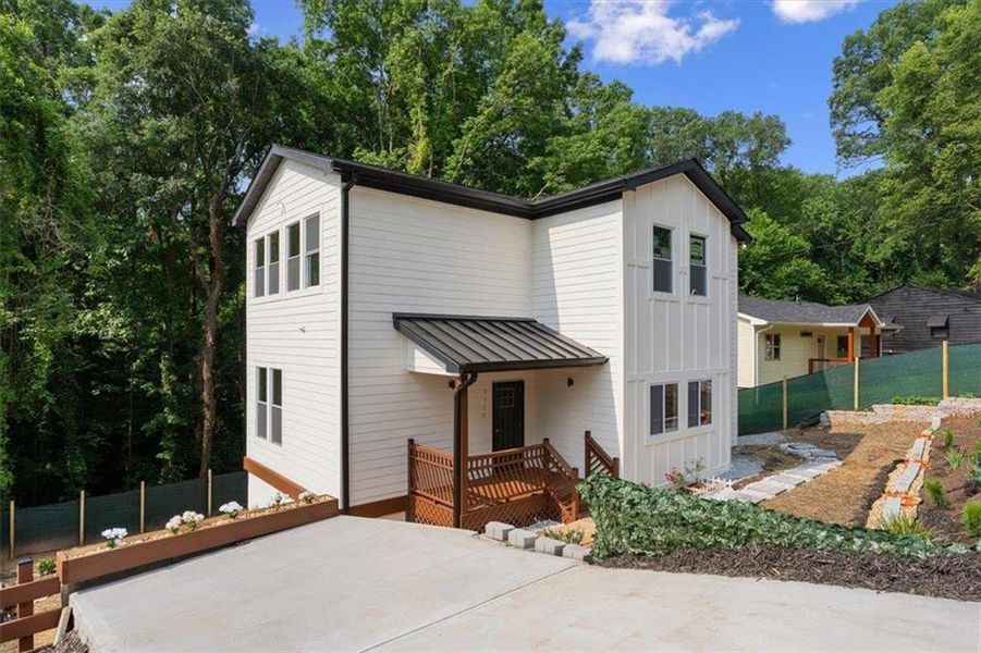 Front exterior of a new home in , Atlanta, GA, highlighting curb appeal (Image 1). Front exterior of a new home in , Atlanta, GA, highlighting curb appeal (Image 1).