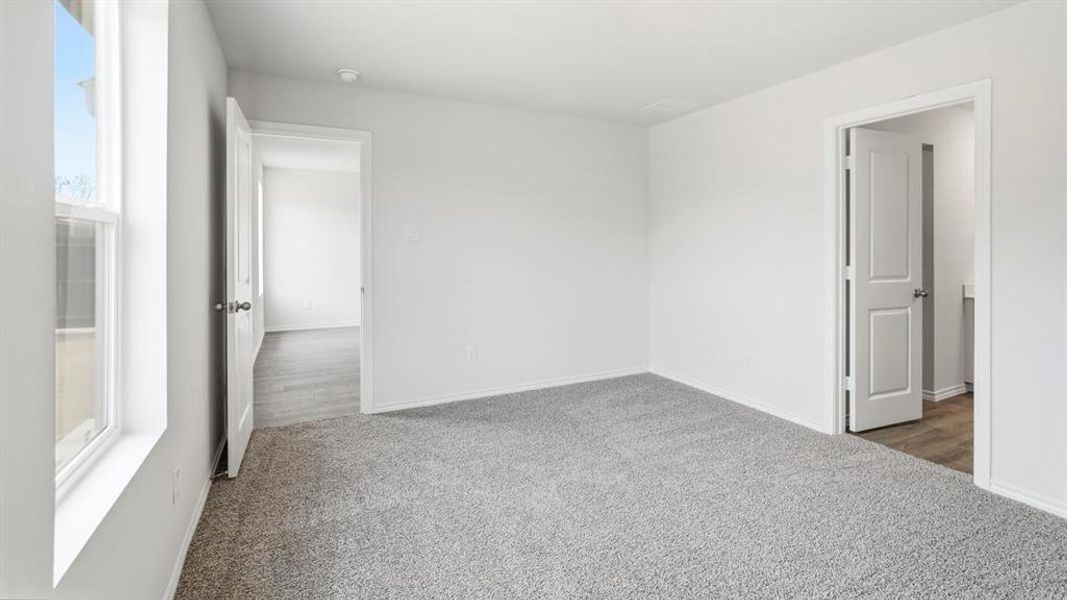 Spare room with light colored carpet Spare room with light colored carpet