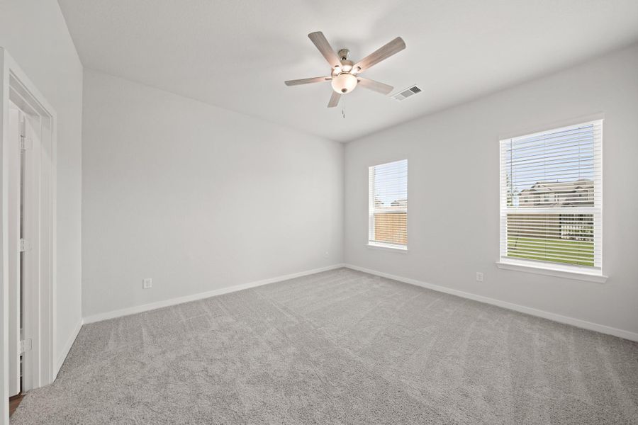 Spacious, unfurnished interior of a new home in Creekland Village at Bridgeland, Cypress (Image 22).