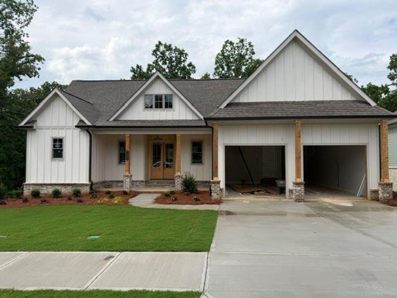 Front exterior of a new home in , Gainesville, GA, highlighting curb appeal (Image 1). Front exterior of a new home in , Gainesville, GA, highlighting curb appeal (Image 1).