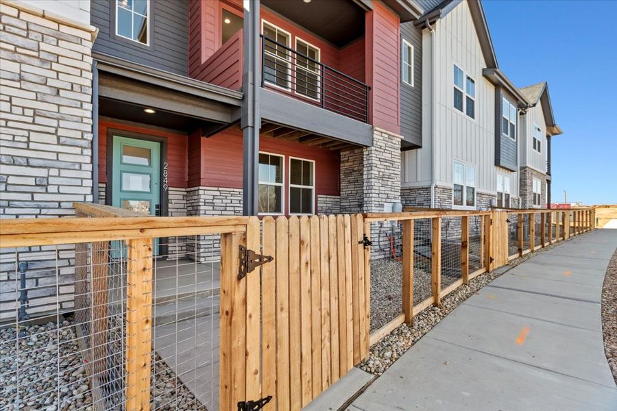 Front exterior of a new home in Arras Park, Thornton, CO, highlighting curb appeal (Image 18).