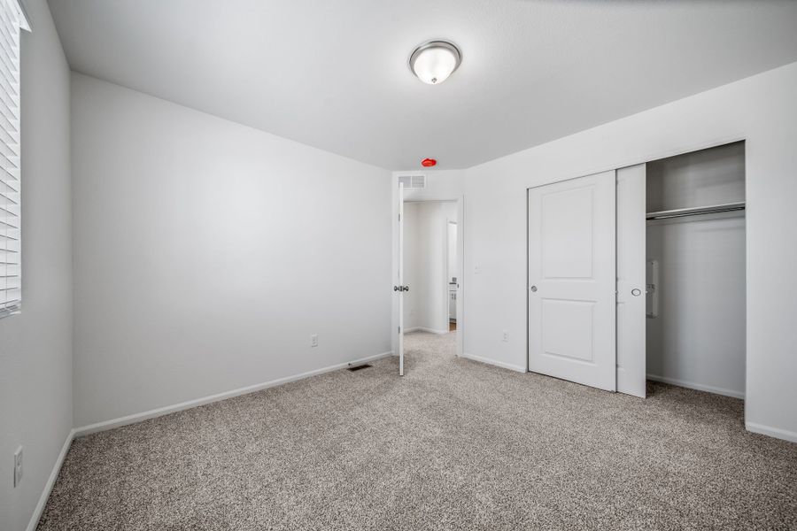 Spacious, unfurnished interior of a new home in Reunion, Commerce City (Image 15).