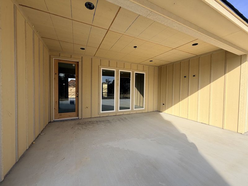 Front exterior of a new home in Saddle Crest Estates, Weatherford, TX, highlighting curb appeal (Image 7).